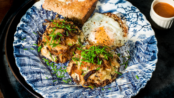 Potato röstis with sauerkraut, fried onions and Barbers 1833 cheddar by Gill Meller